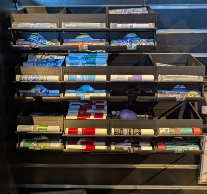 Weiter slatwall display holding 11 products with space for up to 16 products across 8 rows